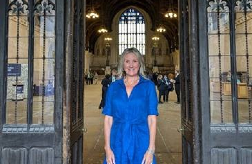 Caroline standing at the door to Westminster Hall