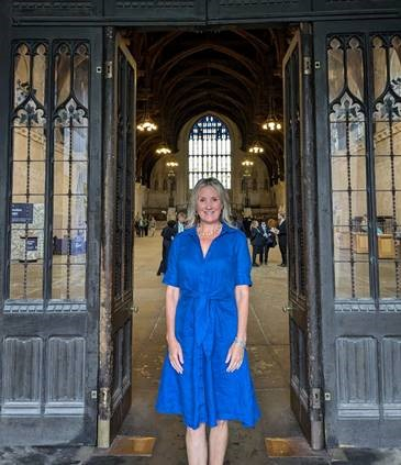 Caroline standing at the door to Westminster Hall